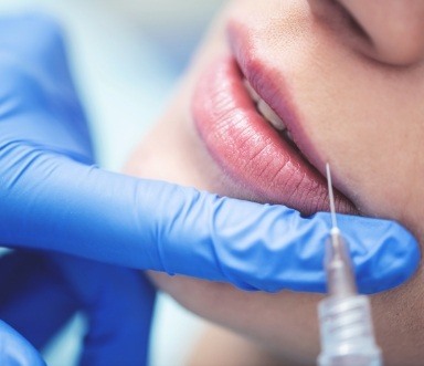 Patient receiving facial esthetic treatments