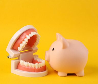 piggy bank and cost of dentures in Burlington 