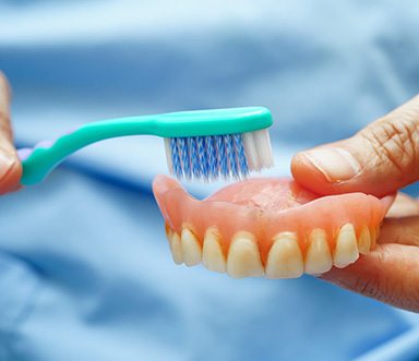 Man and woman together outside smiling