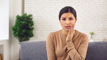 woman with mild dental discomfort 