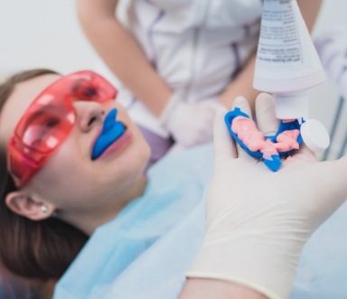 Patient receiving dental sealants