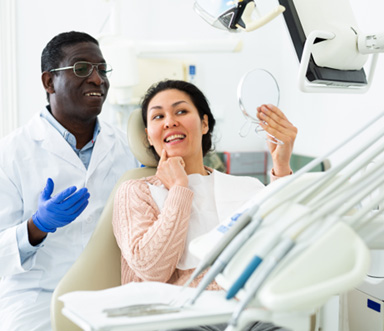 Woman smiling in the dental chair