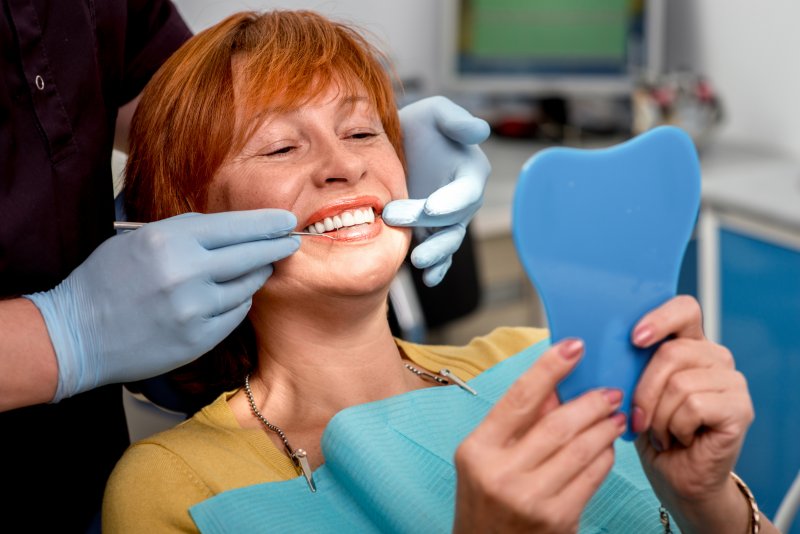 patient smiling with dentures 