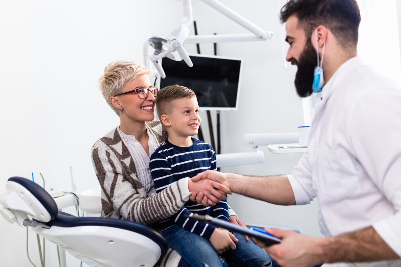 Mother and son visiting a family dentist in Burlington