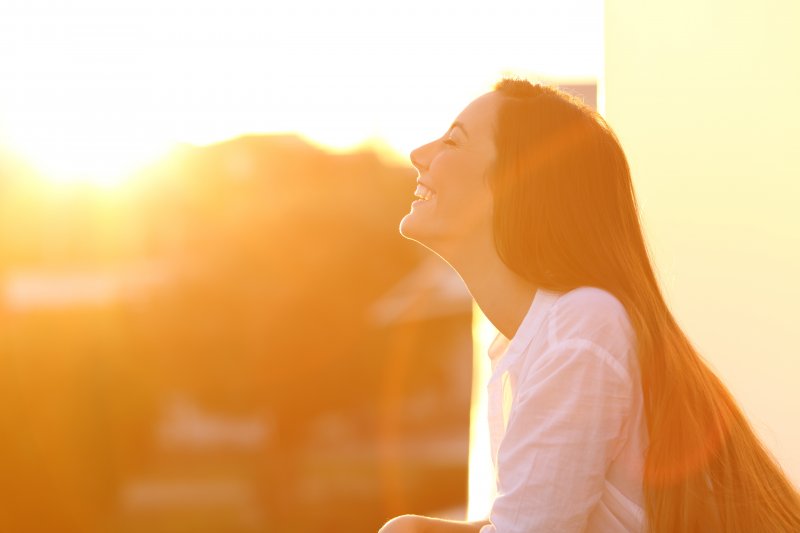 Woman smiling outside