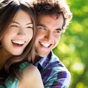 couple with great teeth thanks to the cosmetic dentist burlington loves complete dental care