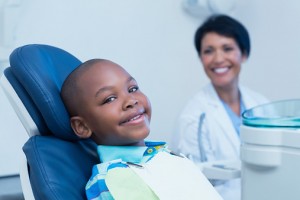 Young boy smiling at dentists burlington trusts